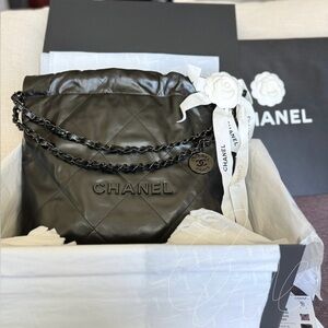 Chanel 22 SO Black hobo bag in small size.